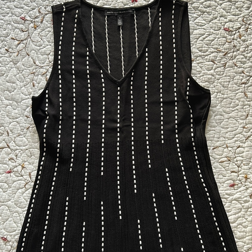 White House black market sleeves less top size small